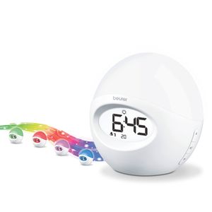 Reloj Despertador con luz de varios colores, cuenta con radio y conexión USB para reproducir música desde el celular - Marca Beurer